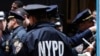 FILE - New York Police Department (NYPD) officers are seen on hand during a protest.