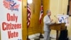 FILE - Luis Gil, a Republican candidate for Franklin County Commissioner in central Ohio, speaks in favor of a constitutional amendment on fall ballots that would prohibit noncitizen voting, at the Ohio Statehouse in Columbus, Ohio, on Oct. 6, 2022. 
