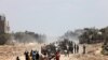 Palestinians who had taken refuge in Rafah in leave the city to return to Khan Yunis after Israel pulled its ground forces out of the southern Gaza Strip, on April 7, 2024, six months into the devastating war sparked by the October 7 attacks.