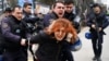 Riot police detain a demonstrator during a protest against the dismissal of academics from universities following a post-coup emergency decree, outside the Cebeci campus in Ankara, Turkey, Feb. 10, 2017. 