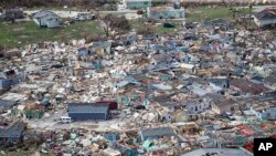 Vista de la destrucción dejada por el huracán Dorian en Marsh Harbour, en la isla Gran Ábaco, en las Bahamas. Sep. 4 de 2019. Foto Al Díaz/Miami Herald via AP.