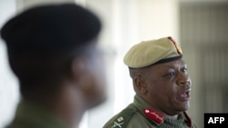 Lesotho's army Major General Lineo Poopa addresses the media at the Makoanyane Barracks in Maseru, on Sep. 1, 2014.