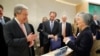 U.N. Secretary-General Antonio Guterres greets Kang Kyung-wha, South Korea's foreign minister, at the Human Rights Council at the United Nations in Geneva, Switzerland, Feb. 26, 2018. 