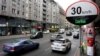 FILE - Cars pass by a speed limit sign displaying a "Thank you," on a street in Berlin, Germany, May 20, 2019. 