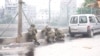 Israeli soldiers operate in Jabalia in the northern Gaza Strip, amid the ongoing conflict between Israel and the Palestinian Islamist group Hamas, in this screen grab taken from a video released on Dec. 9, 2023. (Israel Defense Forces via Reuters)