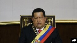 Venezuela's President Hugo Chavez attends a special session at the National Assembly commemorating the country's Independence Day, in Caracas, Venezuela, July 5, 2012. 