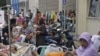 Patients are evacuated from a hospital in Banda Aceh in Aceh province, Indonesia, after an earthquake hit the western coast of Sumatra, April 11, 2012.