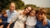 This photo provided by Kensington Palace on Sept. 9, 2024, shows Catherine, Princess of Wales, and Prince William with their children Prince George, right, Princess Charlotte and Prince Louis, left. (Will Warr/Kensington Palace via AP)