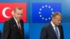 Turkish President Recep Tayyip Erdogan (L) stands with European Council President Donald Tusk before a meeting at the European Council in Brussels, Belgium, May 25, 2017.