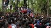 Kashmiri Muslim villagers carry the body of killed rebel commander Saddam Padder, during his funeral in Heff village 65 kilometers (41 miles) south of Srinagar, Indian-controlled Kashmir, May 6, 2018. 