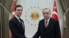 Turkey's President Recep Tayyip Erdogan shakes hands with Jared Kushner (L), U.S. President Donald Trump's adviser, prior to their meeting at the Presidential Palace in Ankara, Turkey, Feb. 27, 2019. 