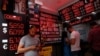 People change money at a currency exchange office in Istanbul, Turkey, Aug. 17, 2018.