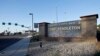 FILE - This Nov. 13, 2013 file photo shows the main gate of Camp Pendleton Marine Base at Camp Pendleton, Calif. 