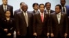 Officials are seen flanking Indonesian President Joko Widodo (2nd from right in front row), host of the Asia Africa Conference in Jakarta, Indonesia, April 21, 2015.