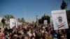Houthi supporters chant slogans during a rally outside the closed U.S. embassy over obver the decision of the Trump administration to designate the Houthis a foreign terrorist organisation, in Sana'a, Yemen, Jan. 18, 2021.
