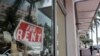 FILE - A 'For Rent' sign hangs on a closed shop during the coronavirus pandemic in Miami Beach, Fla., July 13, 2020. 