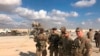 U.S. Soldiers stand at a site of Iranian bombing at Ain al-Asad air base in Anbar, Iraq, Jan. 13, 2020. 