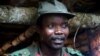 FILE - Joseph Kony, leader of the Lord's Resistance Army during a meeting with a delegation of 160 officials and lawmakers from northern Uganda and representatives of non-governmental organizations, July 31, 2006, Congo near the Sudan border.