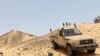 Para kombatan dari kelompok aliansi pemberontak Tuareg yang baku tembak dengan tentara bayaran Rusia, Wagner, tampak di timur laut Mali, dekat Mali, Juli 2024. (Foto: Coordination of Azawad Movements via Reuters)