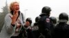 Outside the Odessa trade union building where a deadly fire occurred, a woman mourns on May 3, 2014.