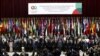 Asian and African leaders pose for photographs during a photo session to mark the 60th Asian-African Conference Commemoration at Gedung Merdeka in Bandung, Indonesia, April 24, 2015.