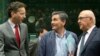 FILE - Greek Finance Minister Euclid Tsakalotos, center, speaks with Dutch Finance Minister Jeroen Dijsselbloem, left, and French Finance Minister Michel Sapin during a meeting of eurozone finance ministers in Brussels, July 7, 2015. 