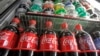 FILE - Sugar-sweetened drinks in a store's refrigerator, Feb. 20, 2013