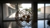 FILE - The United Nations logo is seen on a window at United Nations headquarters, in New York, Sept. 21, 2020.