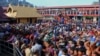 FILE - Hindu worshippers stand in long queues outside the Sabarimala temple in the southern Indian state of Kerala, Dec. 1, 2015.