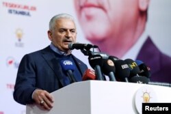 AK Party candidate for mayor in Istanbul, Binali Yildirim, speaks outside of the party headquarters in Istanbul, Turkey March 31, 2019.