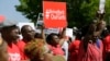 Protesters march in support of the girls kidnapped by members of Boko Haram in front of the Nigerian Embassy in Washington on May 6, 2014. 