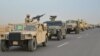 Egyptian Army armored vehicles are seen on a highway traveling toward north Sinai during a launch of a major assault against militants, in Ismailia, Egypt, in this undated handout picture made available by Egypt's Ministry of Defense Feb. 9, 2018.