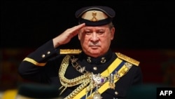 King of Malaysia Sultan Ibrahim Iskandar salutes the guard of honour during a welcoming ceremony at the National Palace in Kuala Lumpur, on Jan. 31, 2024.