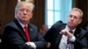 U.S. President Donald Trump listens next to acting U.S. Defense Secretary Patrick Shanahan during a Cabinet meeting on day 12 of the partial U.S. government shutdown at the White House in Washington, Jan. 2, 2019.