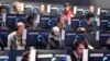 FILE - Visitors try out the latest video games at the Gamescom fair for computer games in Cologne, Germany, Aug. 22, 2017. The World Health Organization is adding Gaming disorder to the section on Mental and Addictive Disorders in its new International Classification of Diseases.