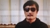 In this image made from video, blind legal activist Chen Guangcheng is seen on a video posted to YouTube Friday, April 27, 2012 by overseas Chinese news site Boxun.com. 