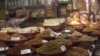 A shop in New Delhi sells almonds and walnuts, which are among the 29 U.S. products on which India has announced retaliatory tariffs starting August 4. India is the largest market for U.S. almonds. (A. Pasricha/VOA)