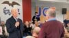 Democratic 2020 U.S. presidential candidate and former U.S. Vice President Joe Biden faces off with a local resident challenging him about his son Hunter Biden's involvement with Ukraine in this screen grab made from video shot during a campaign event.