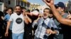 Mourners carry a body during the funeral of Palestinians who were killed in an airstrike during an Israeli raid, in Tubas in the Israeli-occupied West Bank, Sept. 13, 2024. 