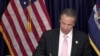In this photo made from video provided by the office of New York Governor Andrew M. Cuomo, he signs into law, June 12, 2020, a sweeping package of police accountability measures.