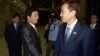 Kim Kiwoong, right, the head of South Korea's working-level delegation, shakes hands with his North Korean counterpart Park Chol Su after their meeting at Kaesong Industrial District Management Committee in Kaesong, North Korea, July 25, 2013. 