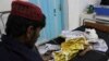 An injured boy receives treatment at a hospital after an airstrike in Helmand province, southern Afghanistan, Nov. 28, 2018. Civilians and Taliban fighters were killed in the strike as Afghan government forces battled insurgents.