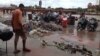 A pile of garbage lies on the riverbank along the Ganges riverfront known as "Har ki Pauri," the most sacred spot in the Hindu holy town of Haridwar where devotees throng. (A. Pasricha/VOA)