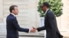 France's President Emmanuel Macron, left, welcomes Rwanda's President Paul Kagame upon his arrival at the Elysee presidential palace in Paris, France, May 23, 2018.