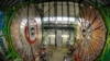 Overview of the first element (L) of the huge magnet of the CMS (Compact Muon Solenoid) experimental site at the European Organization for Nuclear Research CERN (Centre Europeen de Recherche Nucleaire) before its lowering on Thursday in the French village