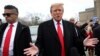 Former U.S. President and Republican presidential candidate Donald Trump speaks as he makes a visit to a polling station on election day in the New Hampshire presidential primary, in Londonderry, New Hampshire, Jan. 23, 2024. 