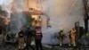 Tim SAR Israel berada di lokasi yang terkena roket yang ditembakkan dari Lebanon, di Kiryat Bialik, Israel utara, pada 22 September 2024. (Foto: AP)