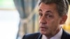 FILE - In this Nov. 6, 2017 file photo, former French President Nicolas Sarkozy attends newly named member of the Constitutional Council Dominique Lottin's oath-taking ceremony at the Elysee Palace in Paris.