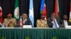 Kenya's President Uhuru Kenyatta, right, and Ethiopia's PM Hailemariam Desalegn and the Chairman of the IGAD Assembly of Heads of State and Government, left, listen to speeches during the special summit, in Nairobi, March 25, 2017.