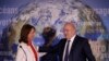French Minister for Ecology, Sustainable Development and Energy Segolene Royal (L) and Finance Minister Michel Sapin attend a news conference to introduce France's first state green bond in Paris, Jan. 3, 2017. 